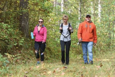 Article: Top 5 reasons to love Rhinelander | Friends hiking the trails at Cassian County Two Way Trail