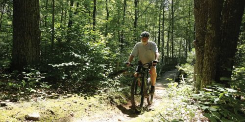 Options for spring entertainment in Rhinelander | Man mountain biking the Washburn Lake Silent Sports Trails Area