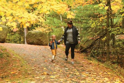 Recomended Article: Nature trails you need to travel | Mom and daughter holding hands on the trail at Almon County Park