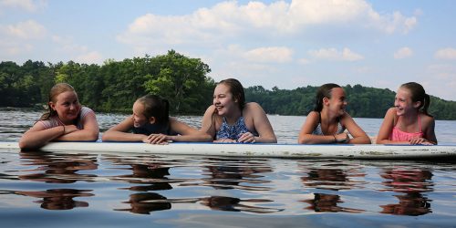 Girls swimming on lake in Rhinelander